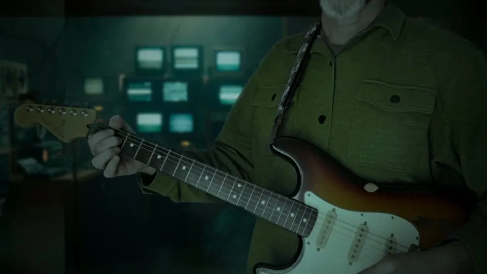 Null-Circuit playing a sunburst electric guitar in the CRT studio